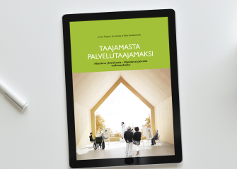 Työpöytä, jolla tabletissa auki "Taajamasta palvelutaajamaksi"-erillisjulkaisun kansi.